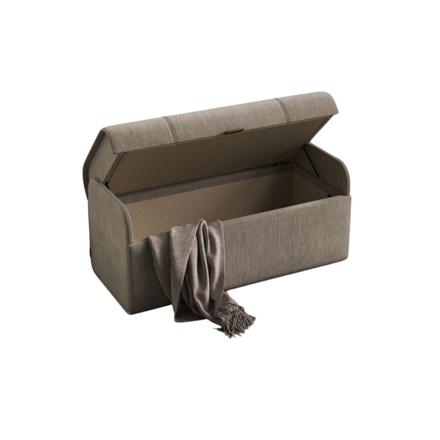 A contemporary small pouf with a storage compartment, upholstered in beige fabric, featuring a front handle for easy access.
