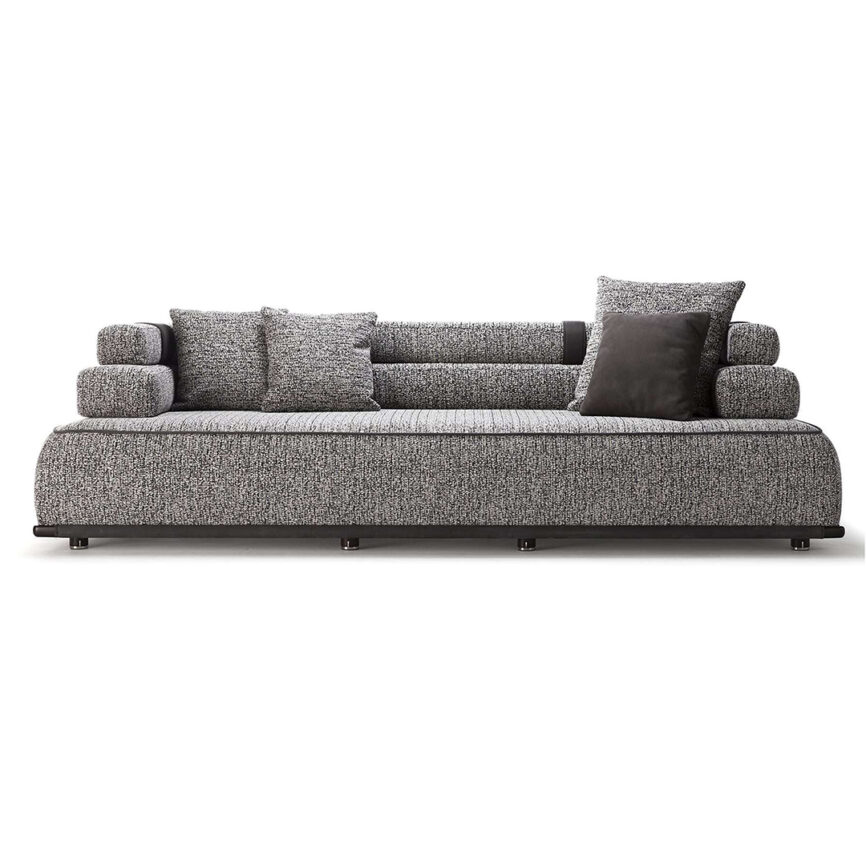 Gray PANAREA sofa with generous proportions, featuring luxurious fabrics and leather inserts, designed for comfort and visual appeal.
