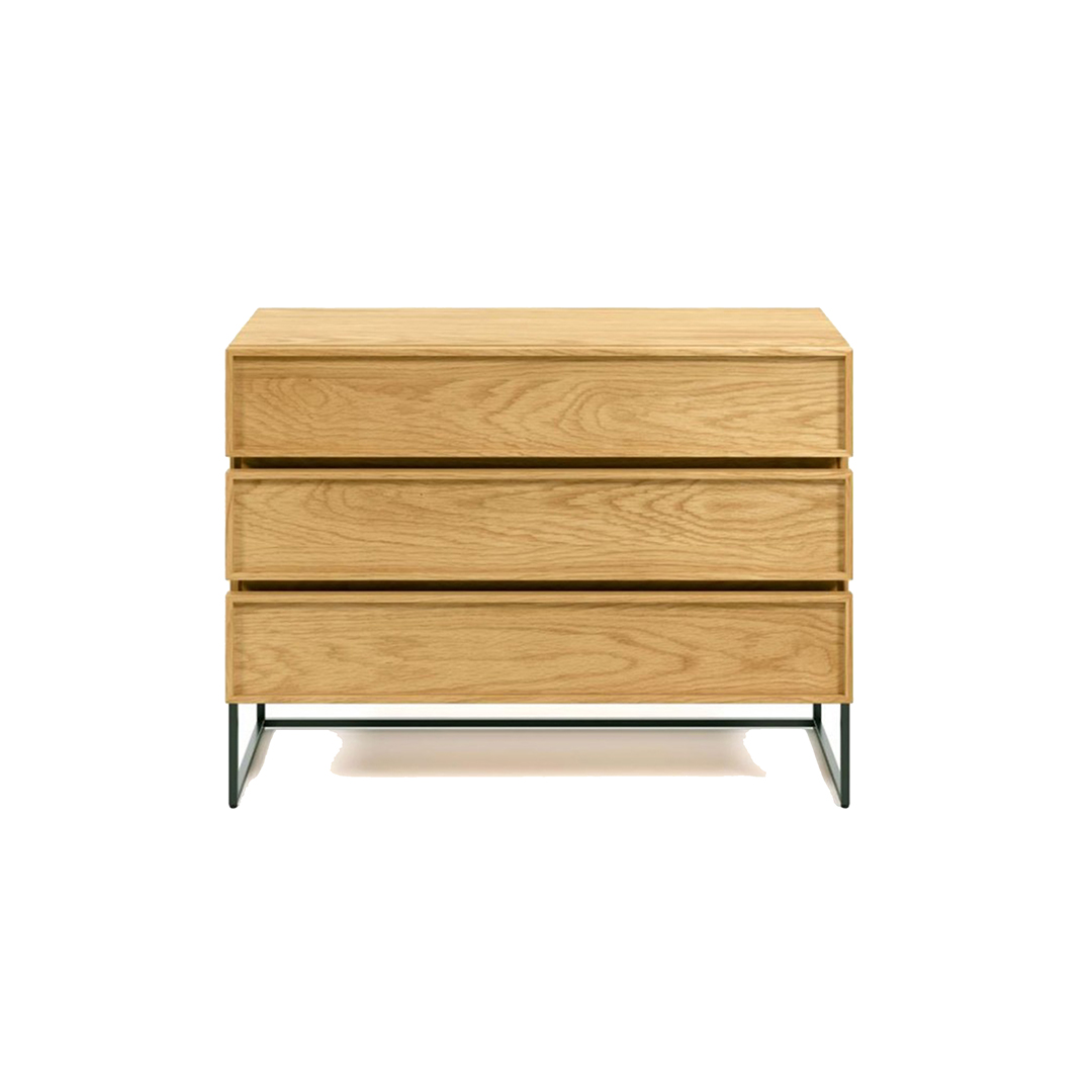 Modern wooden chest of drawers with an oak veneer finish and black metal frame, designed for stylish storage.