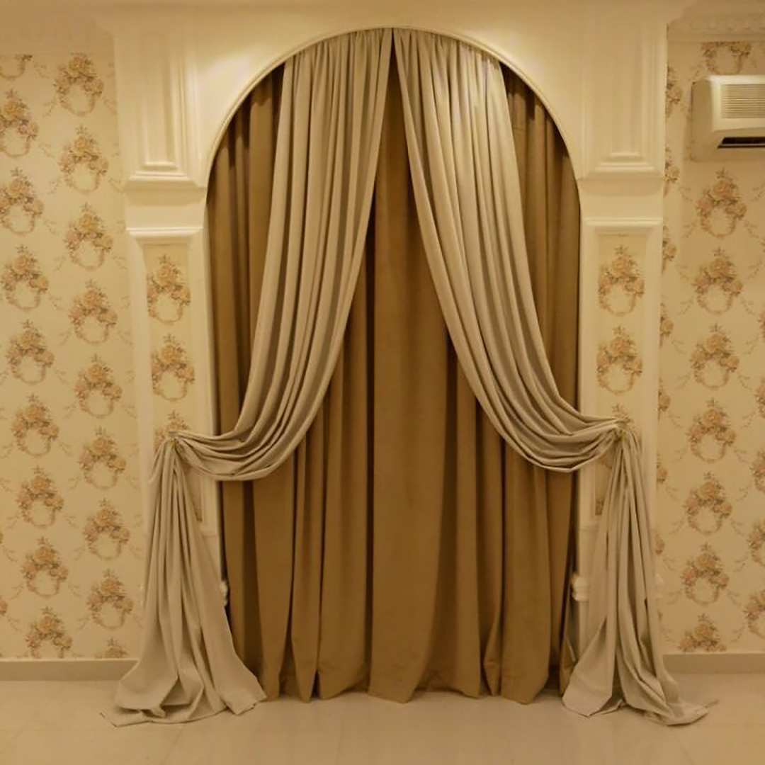 Elegant dual-tone curtain set featuring contrasting light and dark fabrics with decorative trim, designed for custom sizing and privacy.