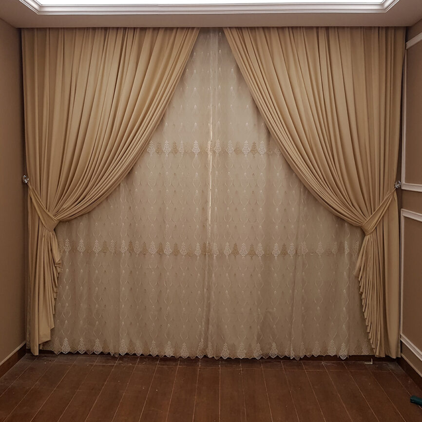 Elegant triple-layer curtain with blackout, sheer, and fabric panels, customizable in size and color, featuring smooth operation and luxury detailing.
