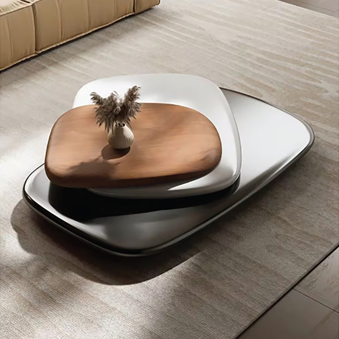Luxury three-tier rotating coffee table with walnut veneer top and matte black steel base, featuring flexible nested design and precision detailing.
