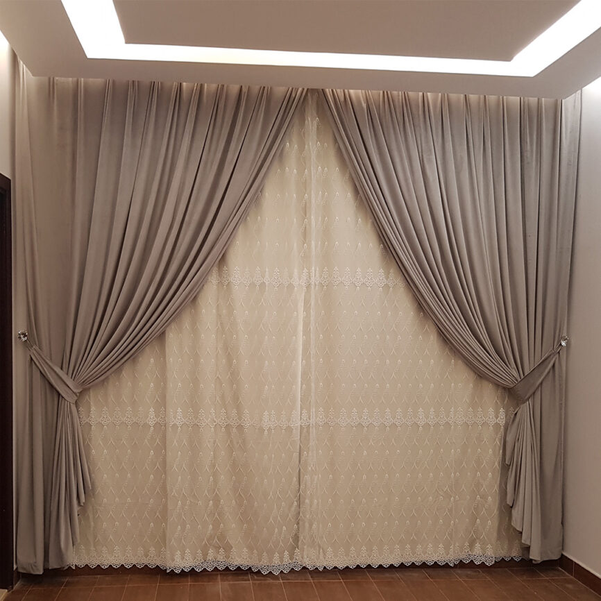 Elegant triple-layer curtain with blackout, sheer, and fabric panels, customizable in size and color, featuring smooth operation and luxury detailing.