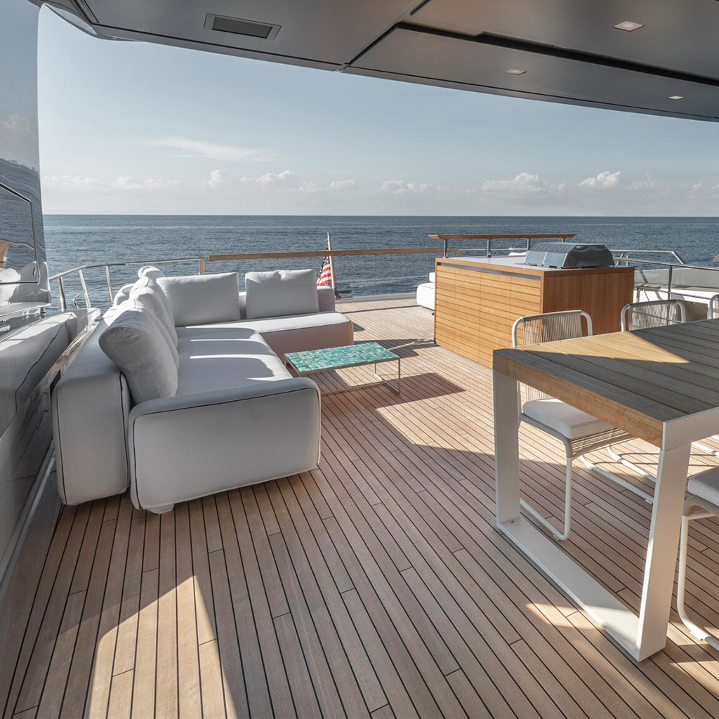 Custom luxury furniture installed in a yacht cabin, showcasing marine-grade craftsmanship, elegant finishes, and space-optimized design.