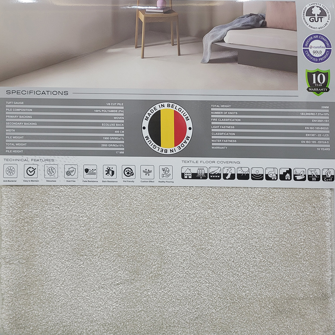 A close-up of the Absolute Comfort Carpet, featuring a plain, refined surface with a soft texture and elegant finish.