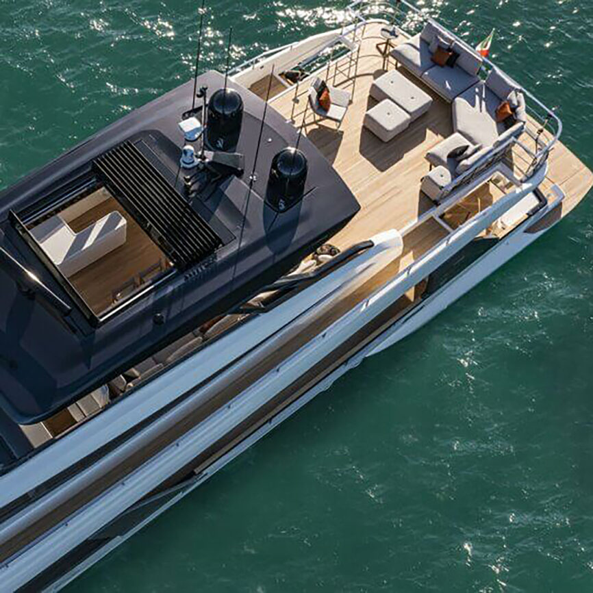Custom modular outdoor yacht sofa with stainless steel frame and marine fabric, designed for saltwater conditions and tailored onboard comfort.