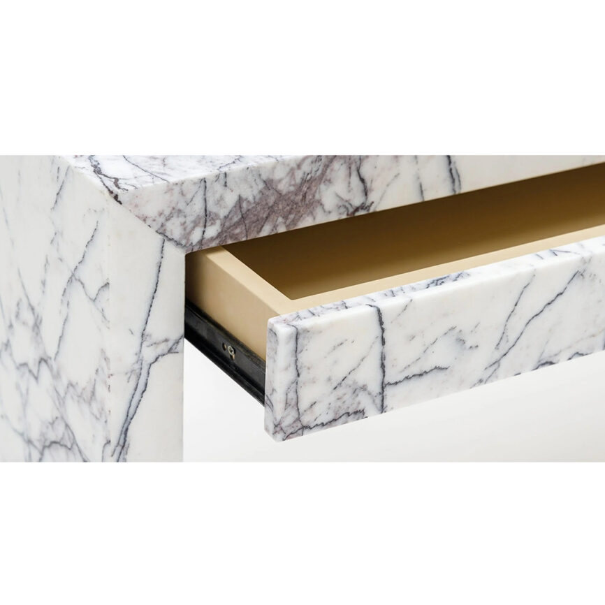 A modern, rectangular marble desk with drawers, featuring a customizable white and gray marble pattern. The desk is designed for elegance and functionality, set against a plain background with branding details.
