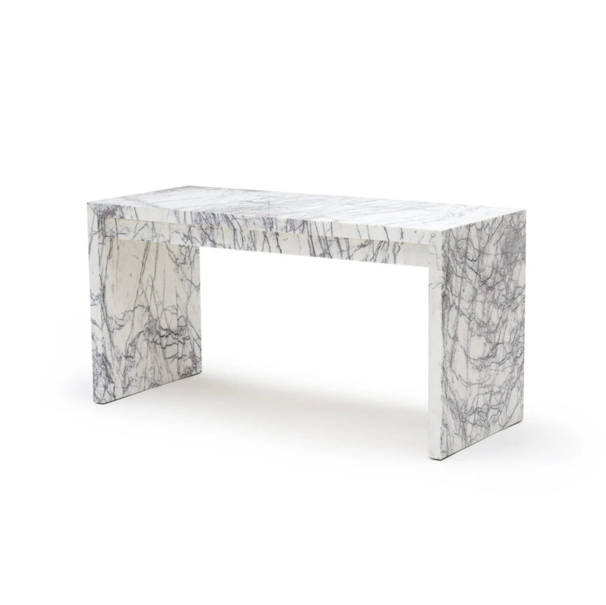 A modern, rectangular marble desk with drawers, featuring a customizable white and gray marble pattern. The desk is designed for elegance and functionality, set against a plain background with branding details.
