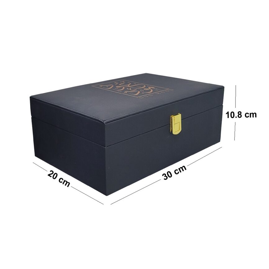 Elegant black perfume box with gold accents and Arabic calligraphy, showcasing a luxurious design.