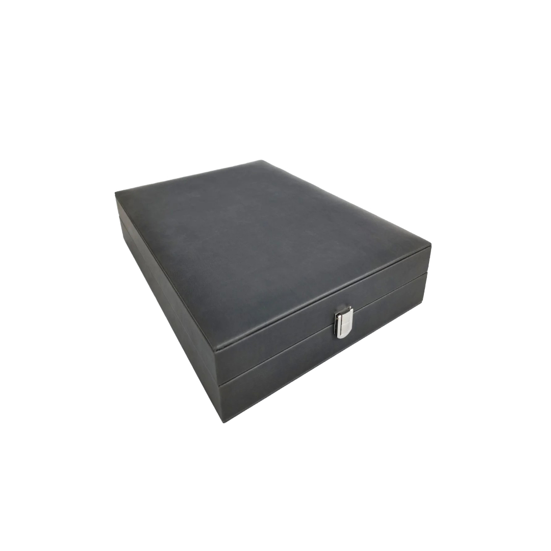 Open black box with gray velvet interior.