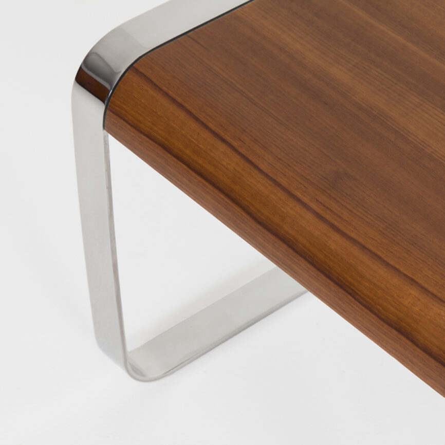 Custom marine yacht table with wooden top and chrome stainless steel legs, built for durability and nautical elegance