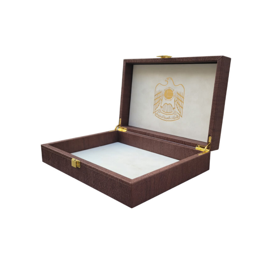 Imperial Symbol Case, A premium brown presentation box with gold hinges, featuring the United Arab Emirates emblem on the inner lid. Designed for luxury storage and customization.
