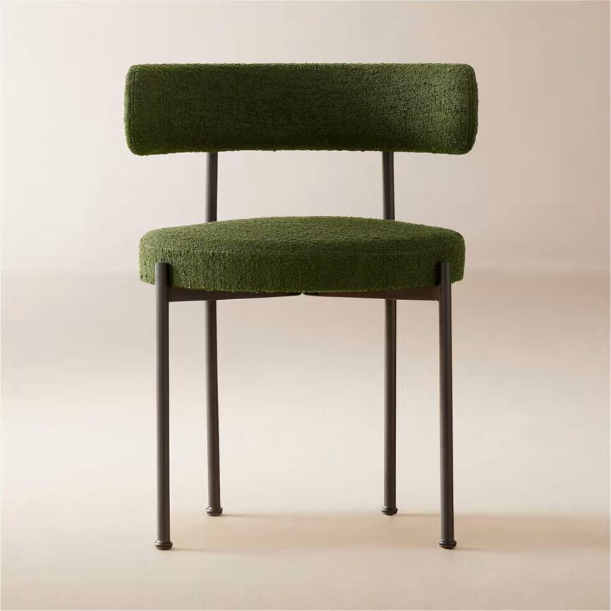 Inesse dining chair with ivory boucle upholstery and matte black steel frame, handcrafted by MZ FURNITURE in UAE.