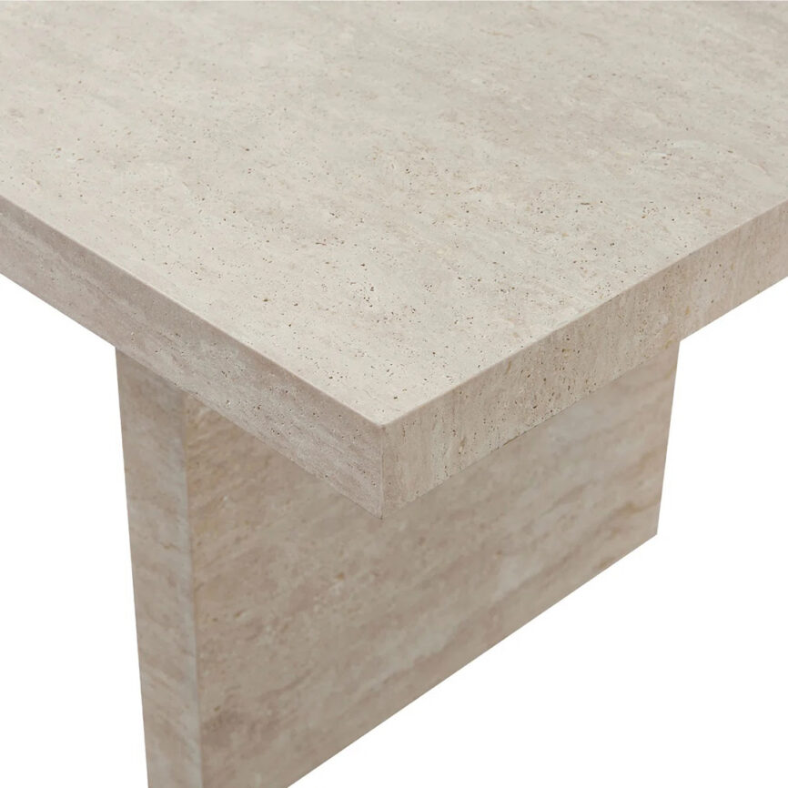 Rectangular travertine dining table with a natural stone top and sturdy base, seating up to 8 people.