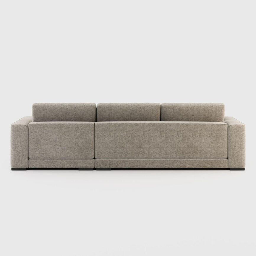 Elegant floor-level view of Emaar Essence sofa with matching décor elements