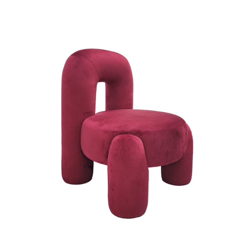 Red velvet accent chair with sculptural design and curved backrest - UAE luxury furniture
